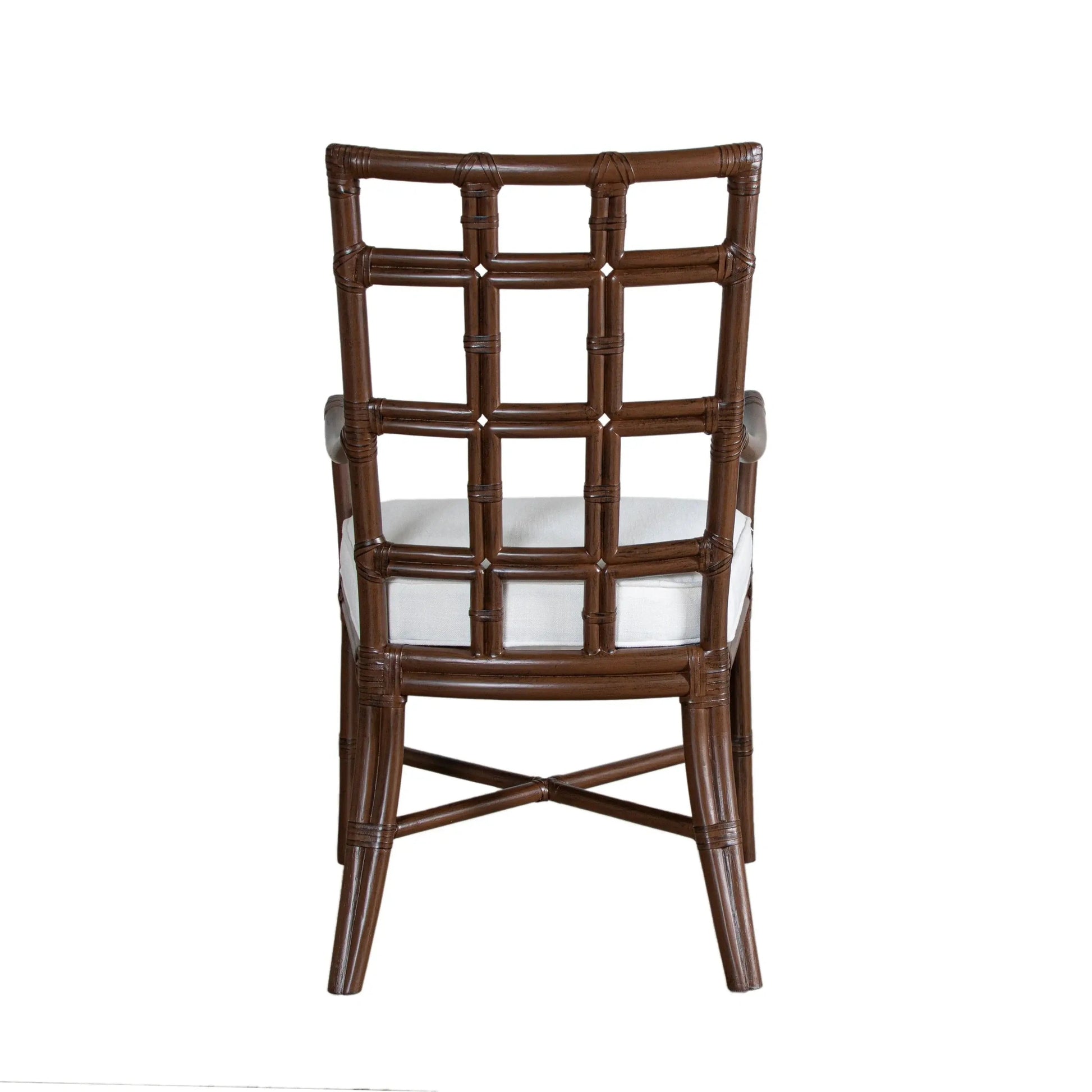 Back view of the Seville Armchair in light mocha rattan, showcasing the square pattern design.