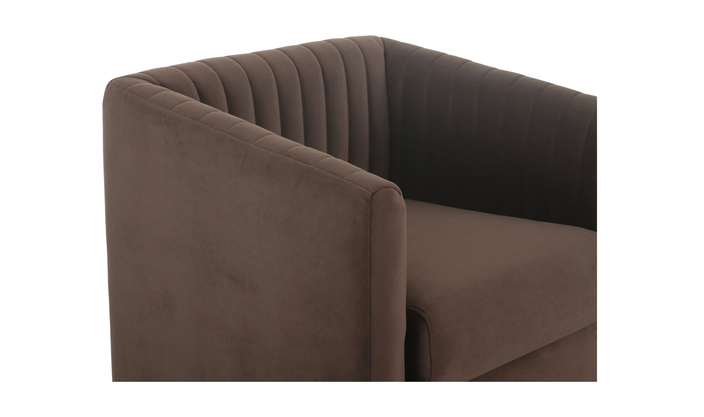 Close-up of the Jane brown velvet dining chair upholstery, featuring channel detailing and plush cushioning.