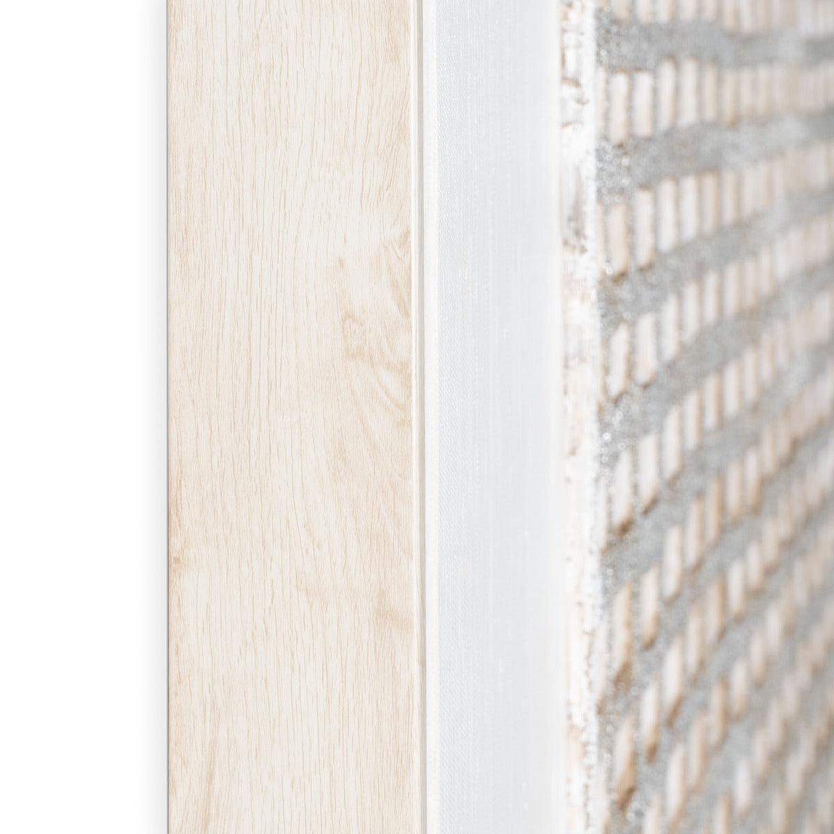 Close-up of wood-colored frame and textured edge of the Agrestal hand-painted canvas.