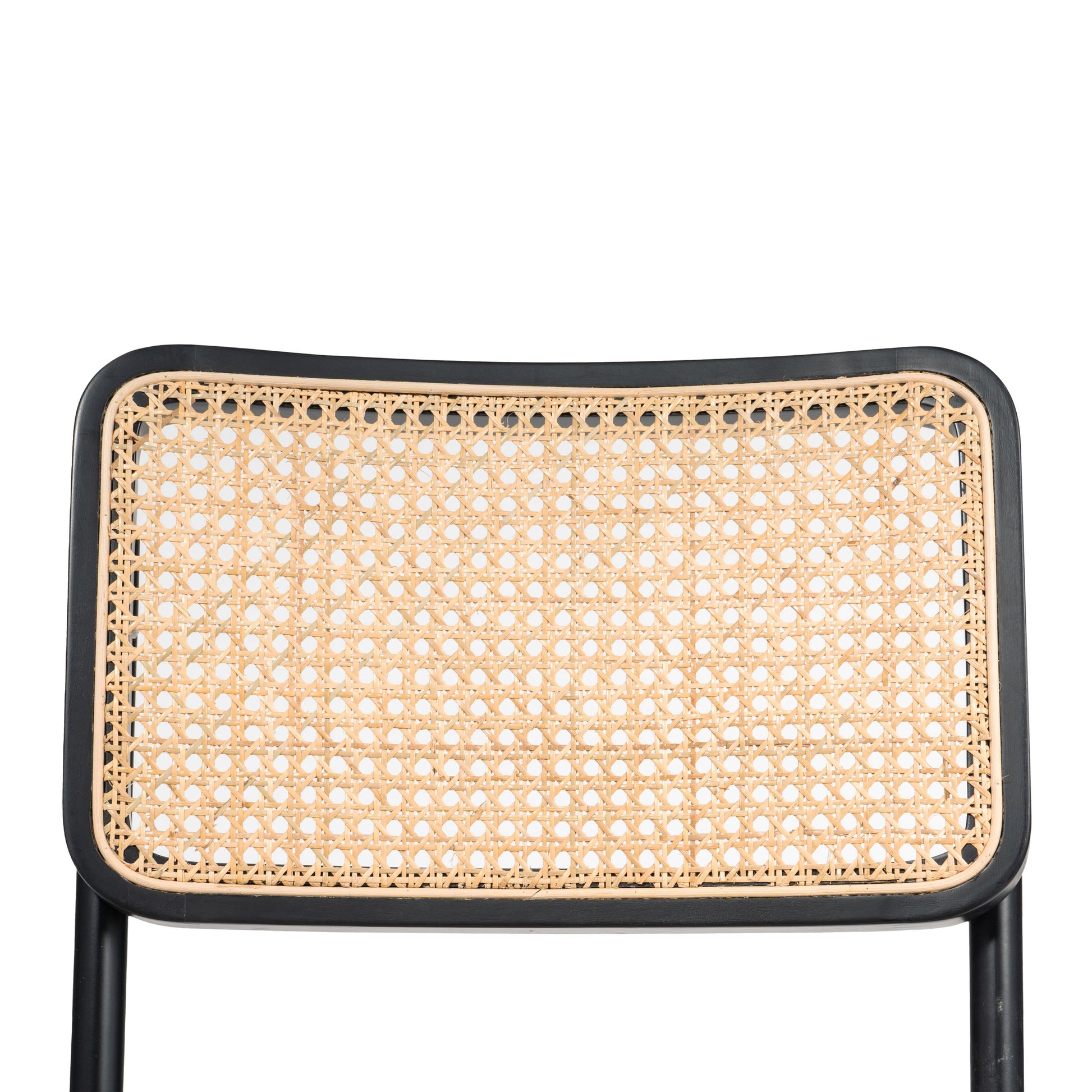 Close-up of cane weave backrest on a modern dining chair, showcasing intricate detailing and natural texture.