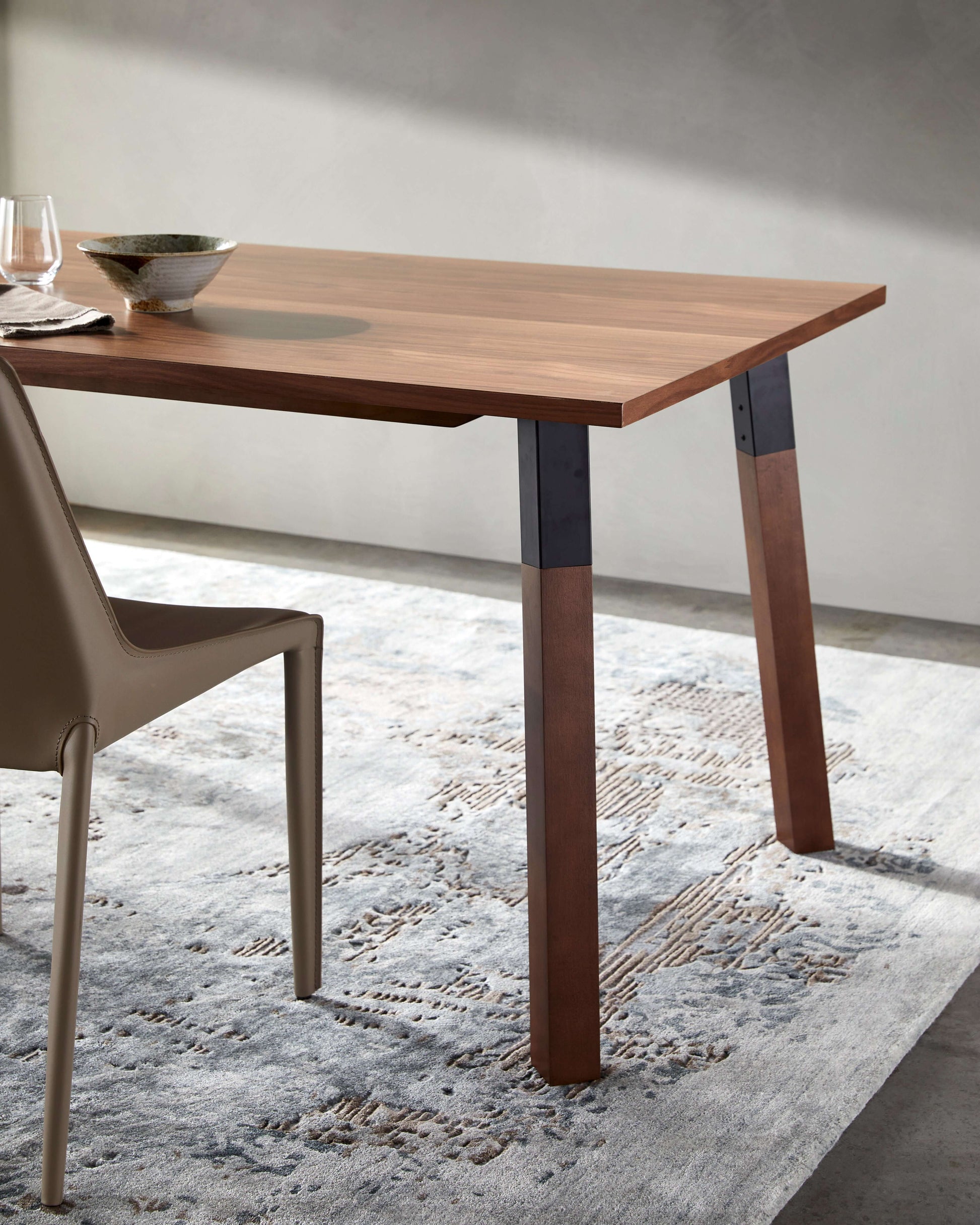 Lifestyle image of the Billings Dining Table by Surya set in a modern dining room, emphasizing its elegance and functionality.