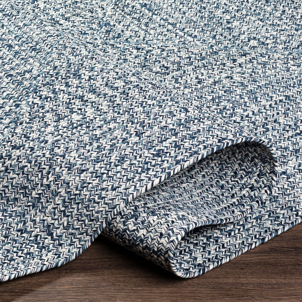 Folded view of Chesapeake Bay Denim Rug displaying premium craftsmanship.