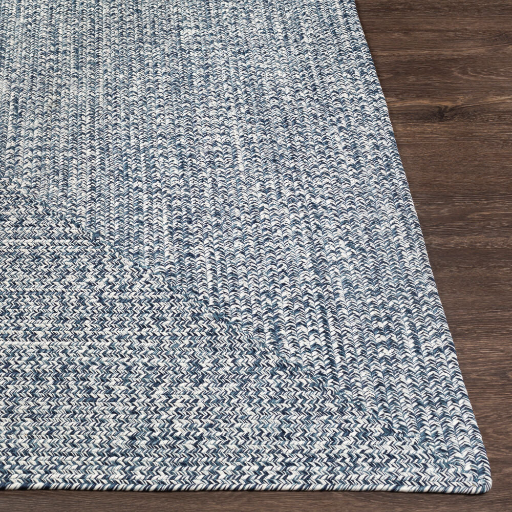 Edge detail of Chesapeake Bay Denim Rug with soft woven texture.
