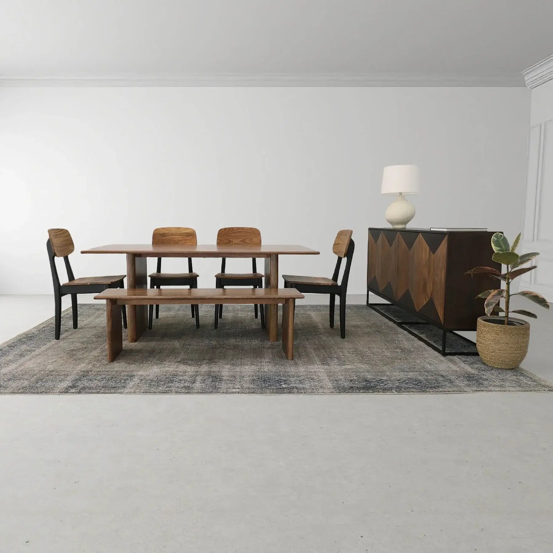 Dallas Solid Wood Dining Table with matching bench and chairs in a minimalist dining room setting.
