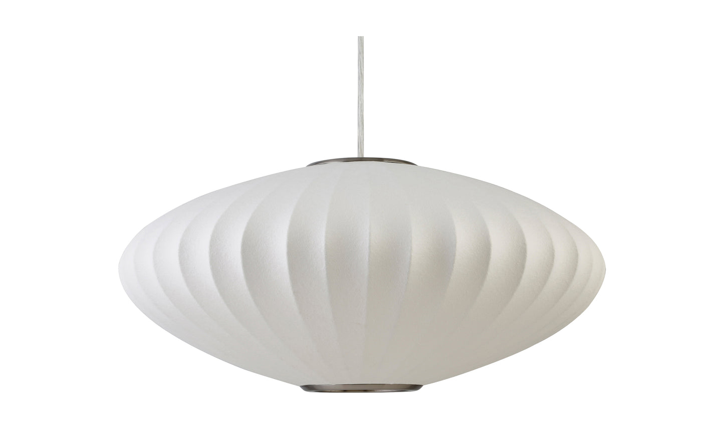 Close-up of the white silk shade on the Lys pendant light with silver canopy.