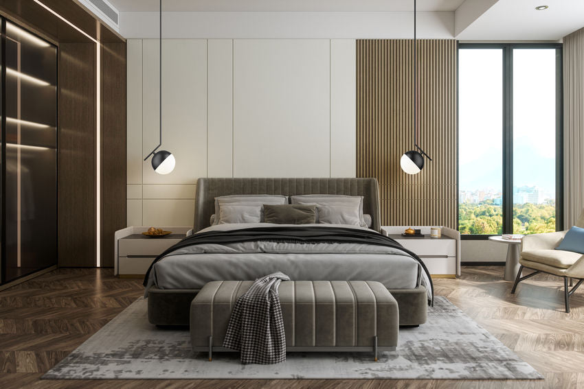 Mid-century modern one-light pendant matte black over bedroom nightstands.