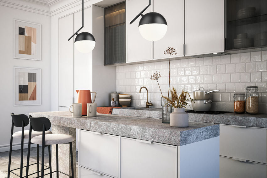 Mid-century modern one-light pendant matte black in modern kitchen.