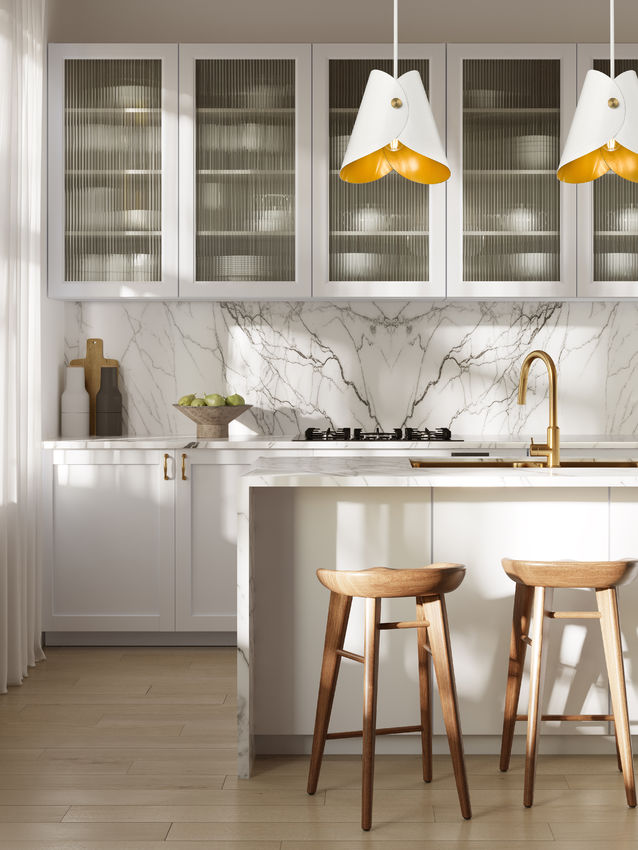 Modern one-light pendant matte white pair over marble kitchen island.