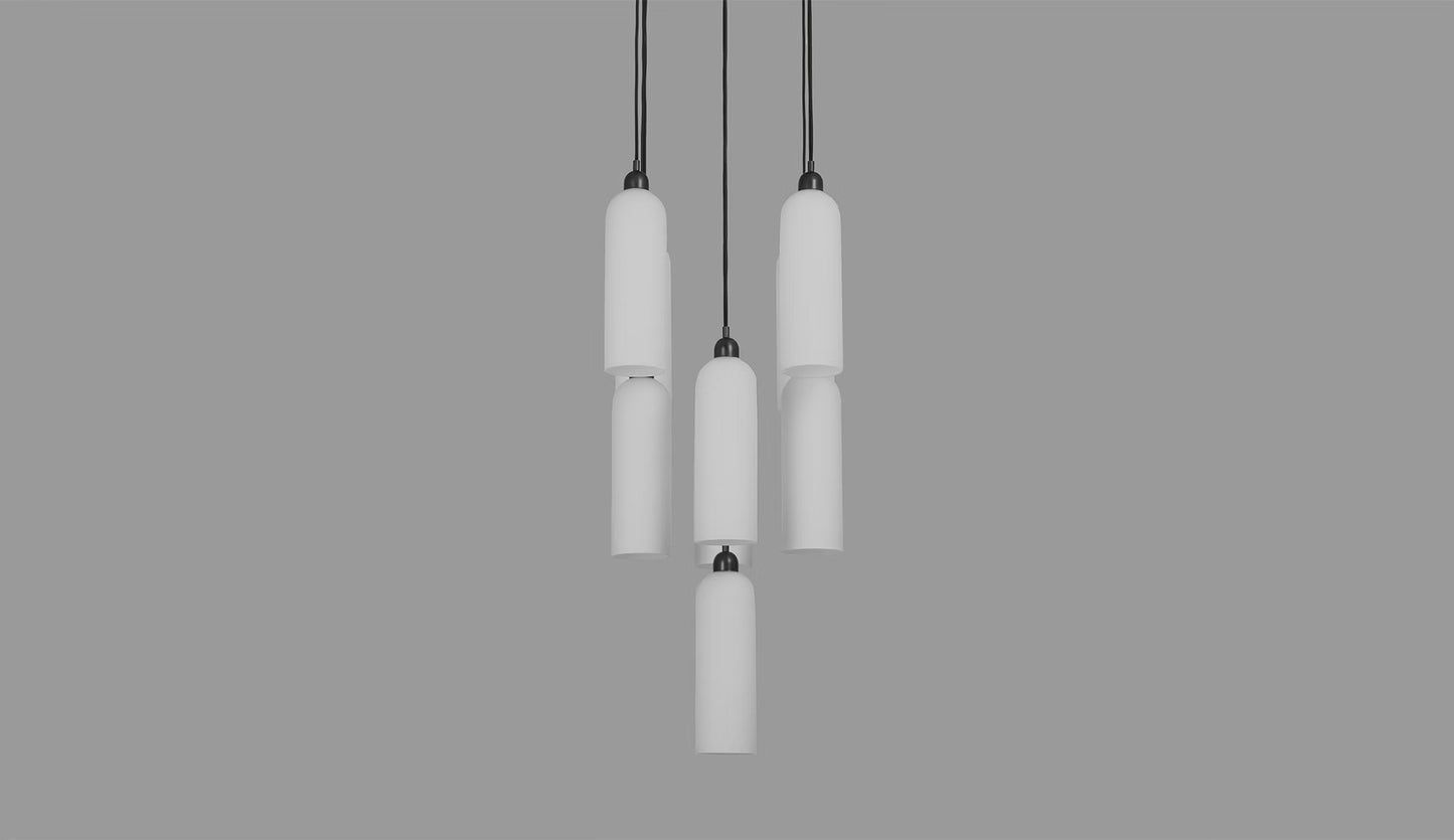 Unlit Odyssey Cluster Chandelier with cylindrical shades in black gunmetal finish.