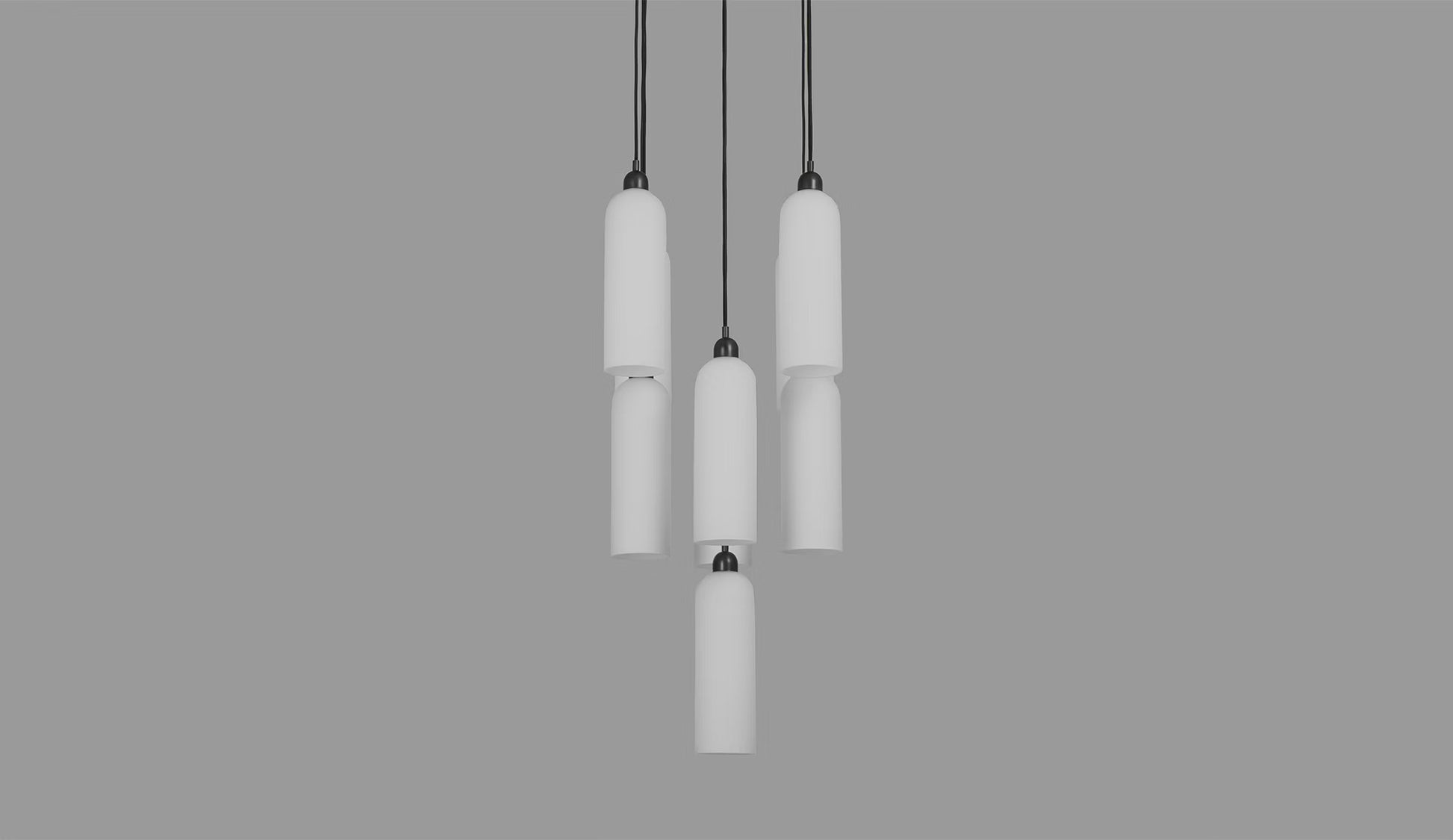 Unlit Odyssey Cluster Chandelier with cylindrical shades in black gunmetal finish.
