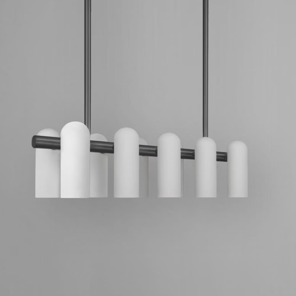 Minimalist polished nickel linear chandelier with frosted glass shades.