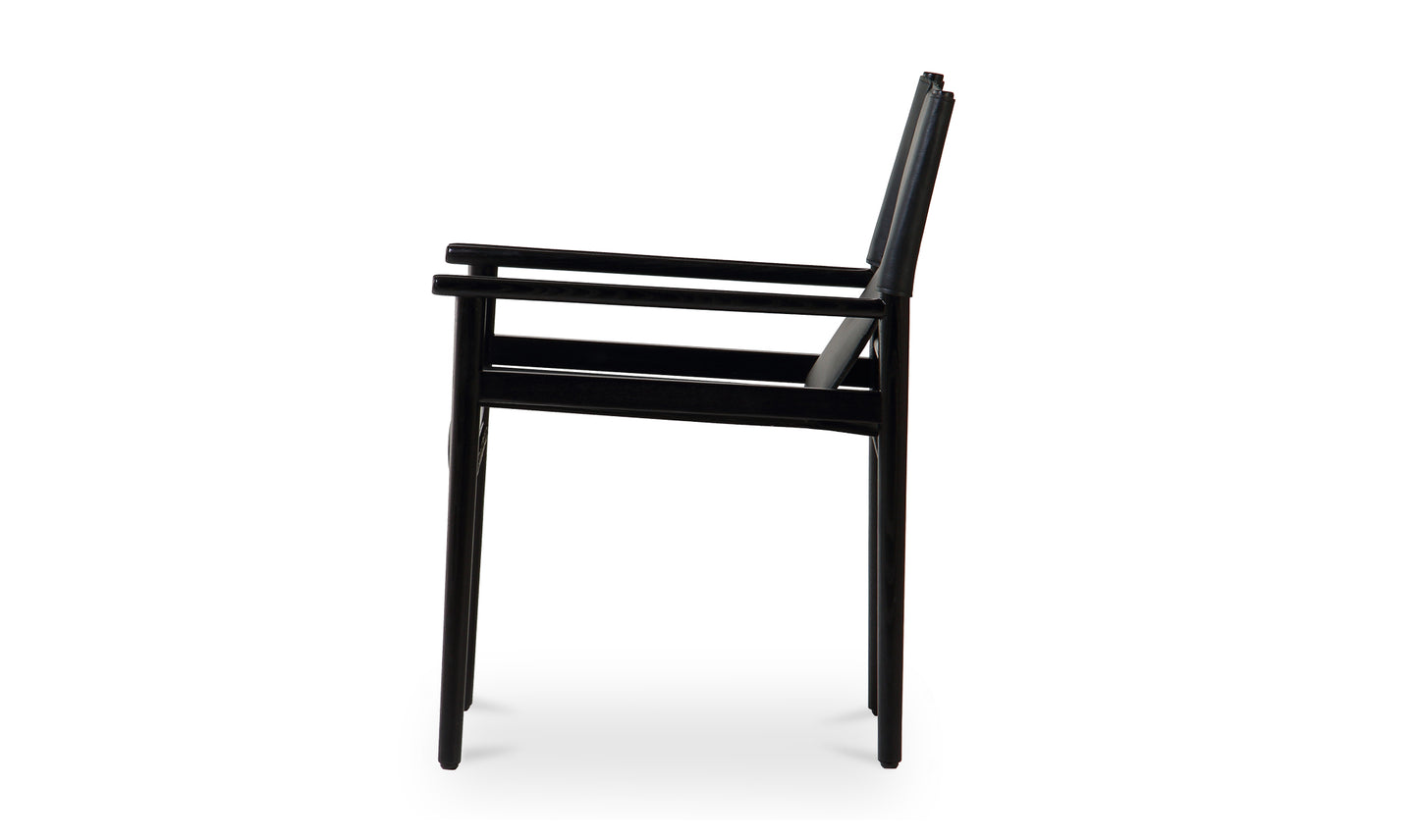 Side view of the Remy Black Leather Dining Chair featuring top-grain buffalo leather and a sleek ash wood frame.