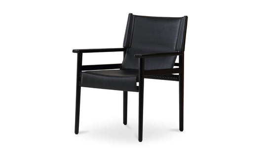 Angled front view of the Remy Black Mid-Centiry Modern Dining Chair showcasing its sleek design with top-grain buffalo leather and black ash wood frame.