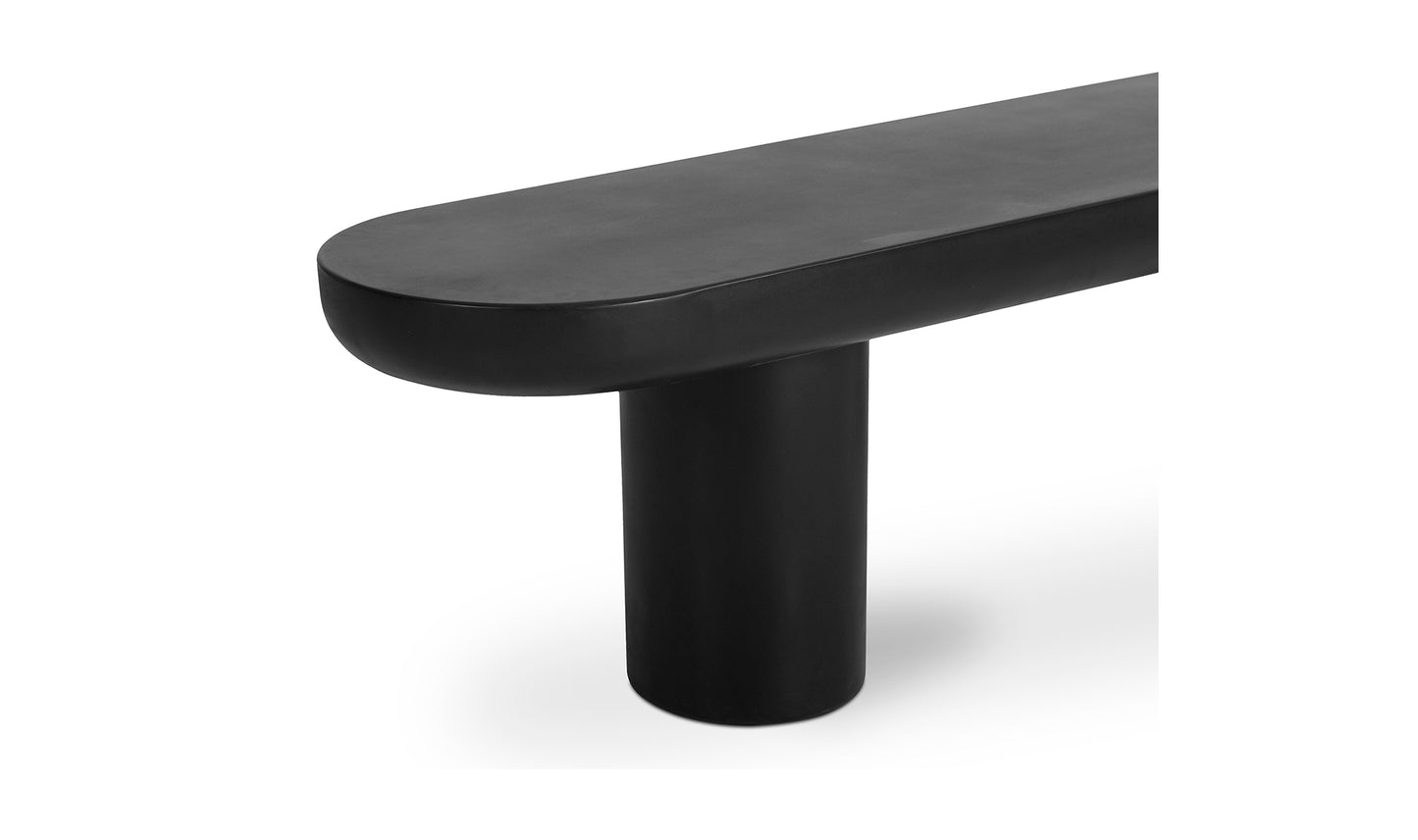 Rocca black concrete dining bench detail of the concrete texture