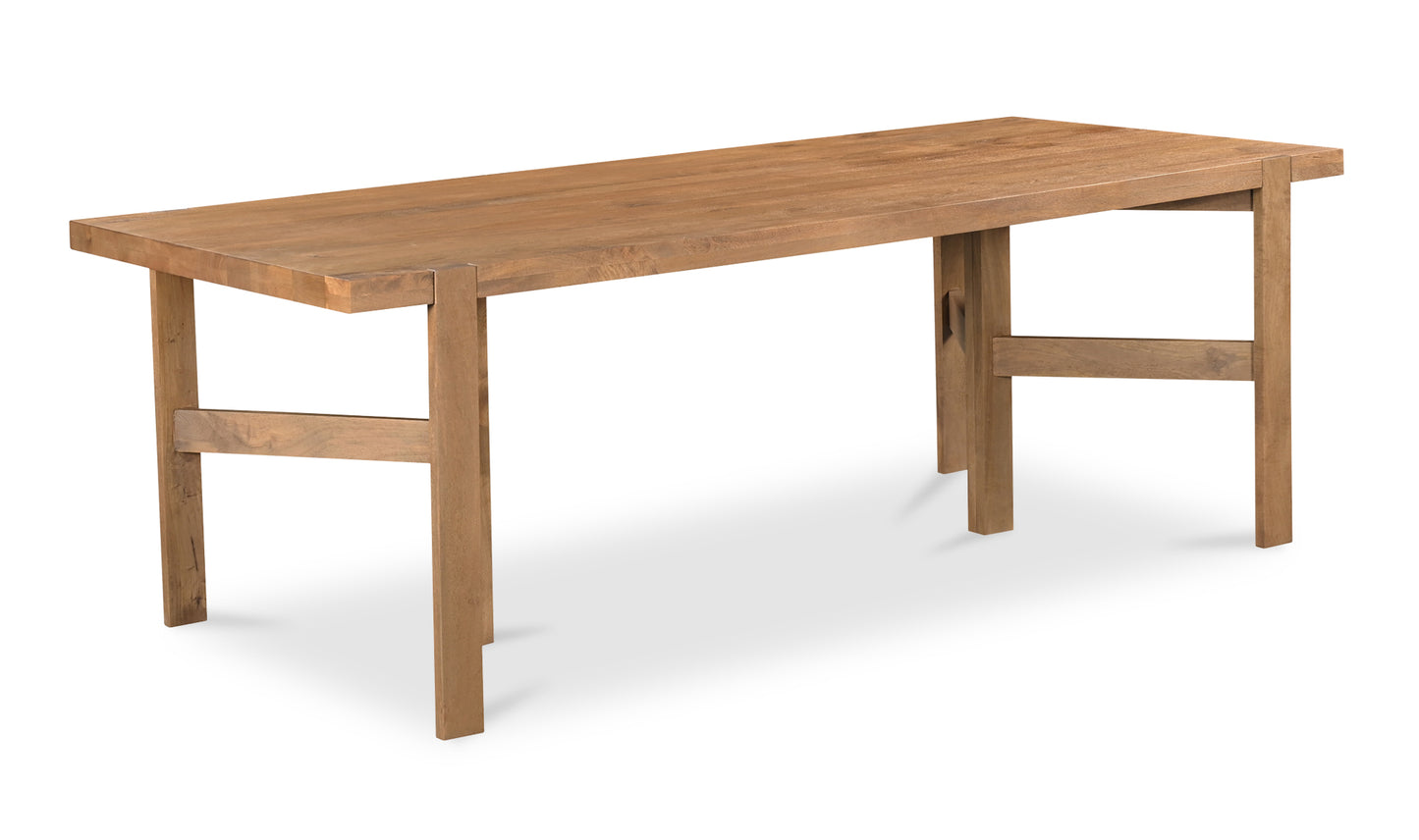 Side angle of the workshop modern wooden dining table's sturdy legs and joinery detailing.