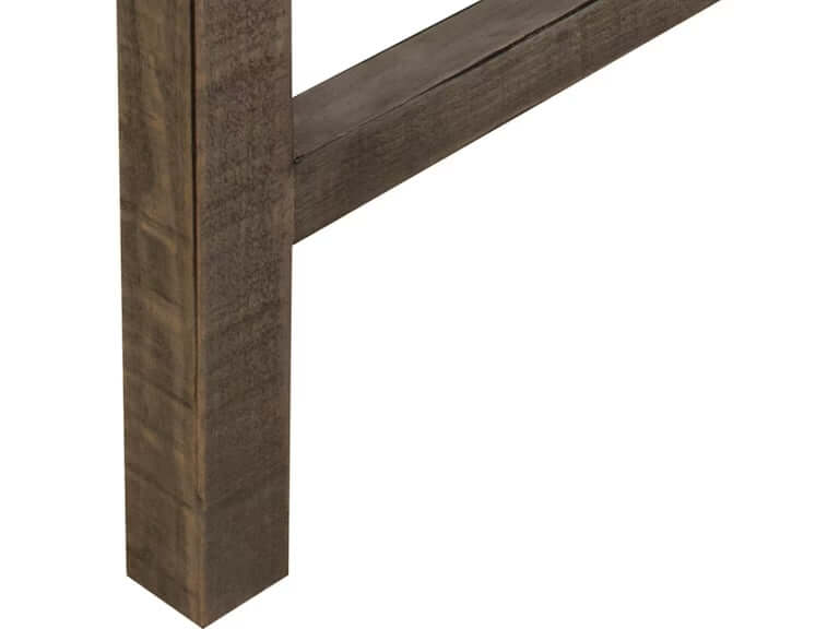 Leg detail of a mango wood dining table showcasing sturdy construction and natural finish.