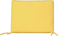 Vibrant buttercup yellow outdoor seat cushion with tie-backs