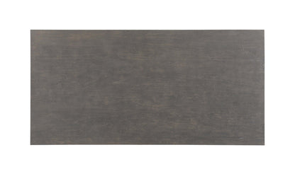 Top-down view of the Brolio Dining Table’s dark mango wood surface, showing the natural wood grain.