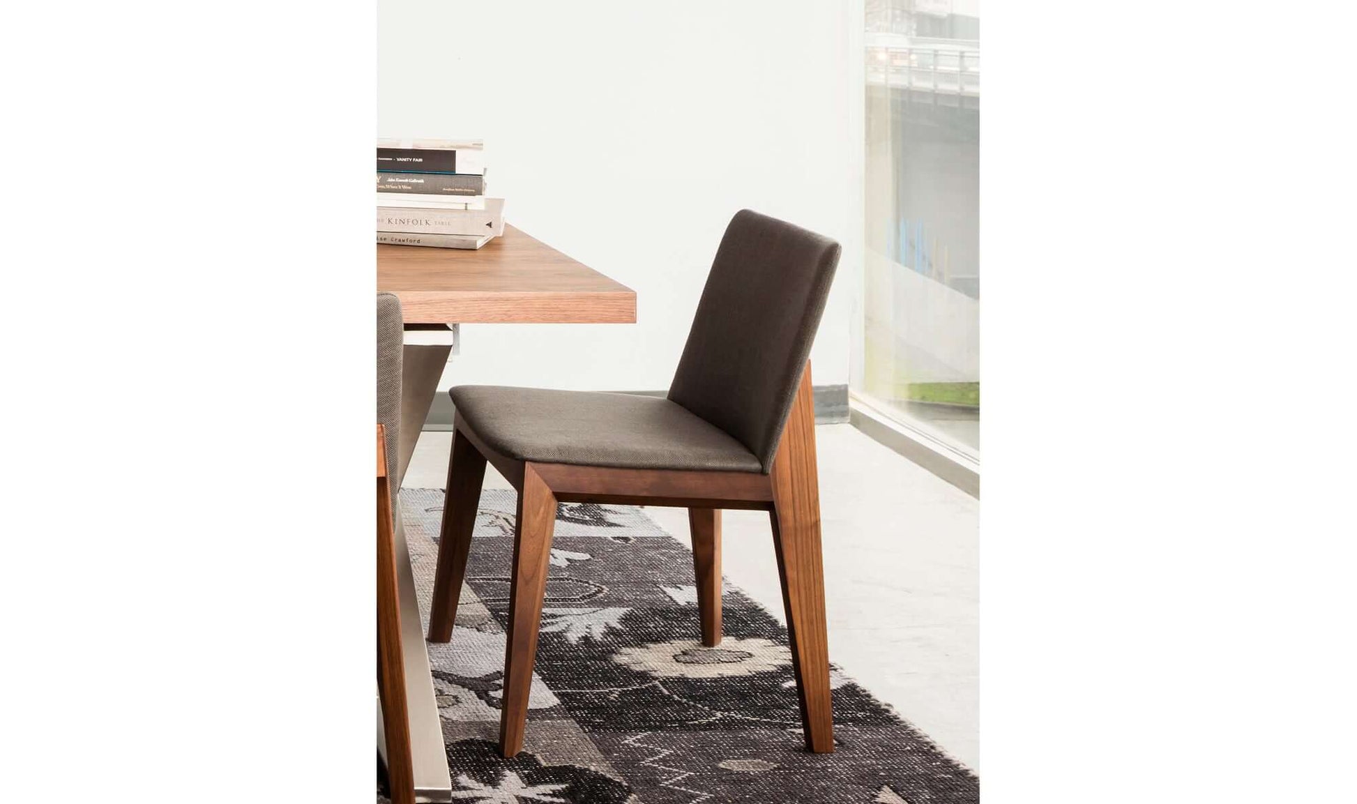 Lifestyle image of Deco Walnut Dark Grey Dining Chair in a dining room setting