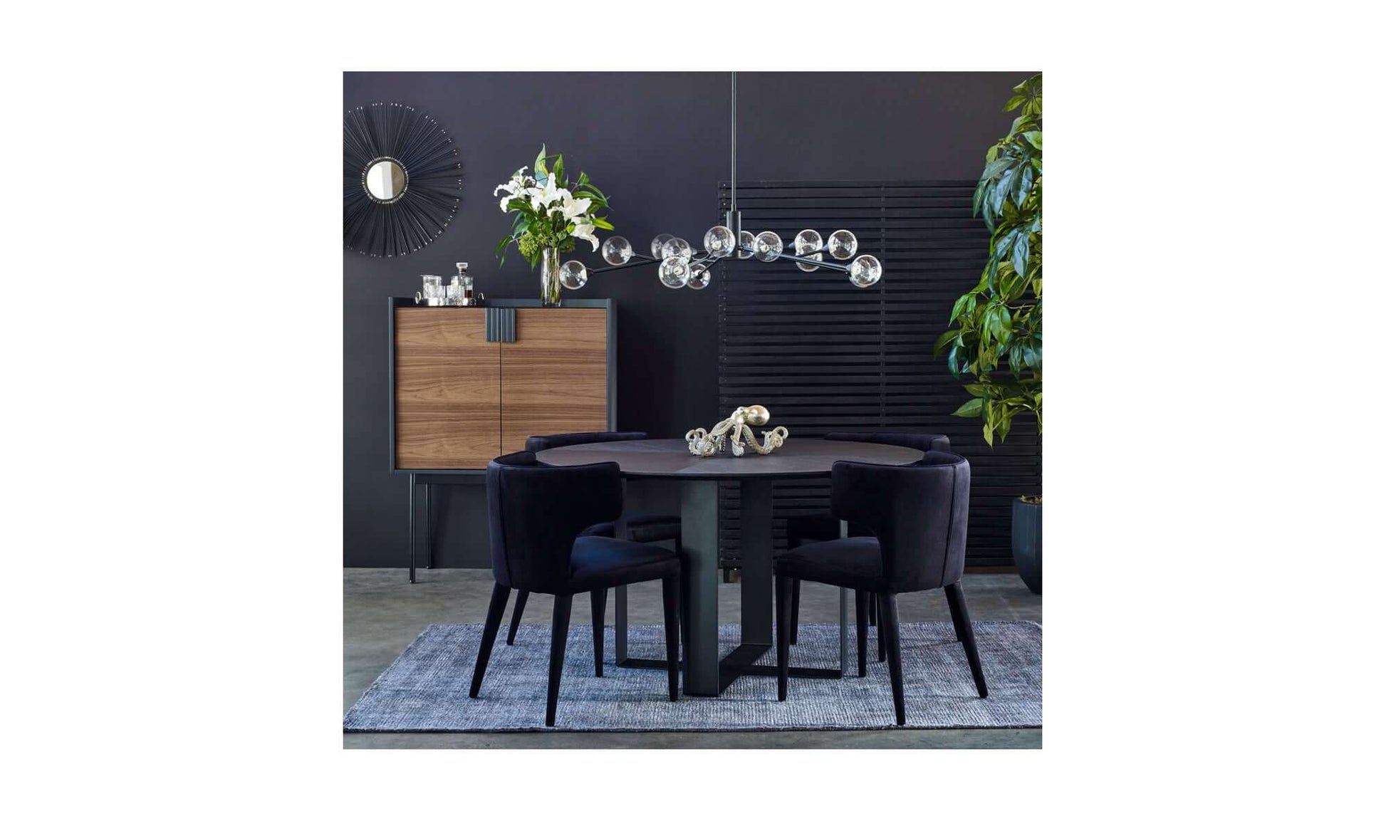 Chic dining setup with Jennaya Black Dining Chairs and a contemporary dining table.