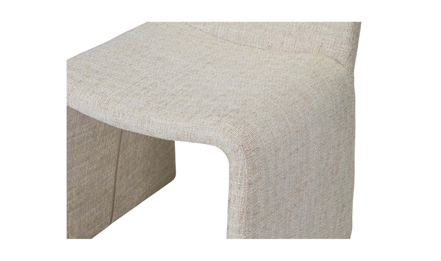 Detailed close-up of the Ella Dining Chair's seat and fabric texture in Heather Beige, showing its high-quality polyester upholstery.