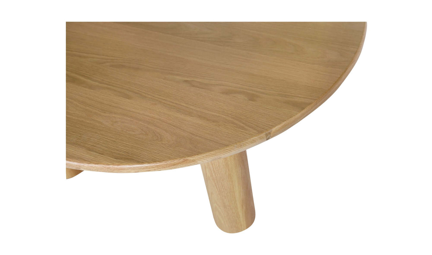 Detailed view of the Milo dining table showing the smooth oak tabletop and rounded edges.