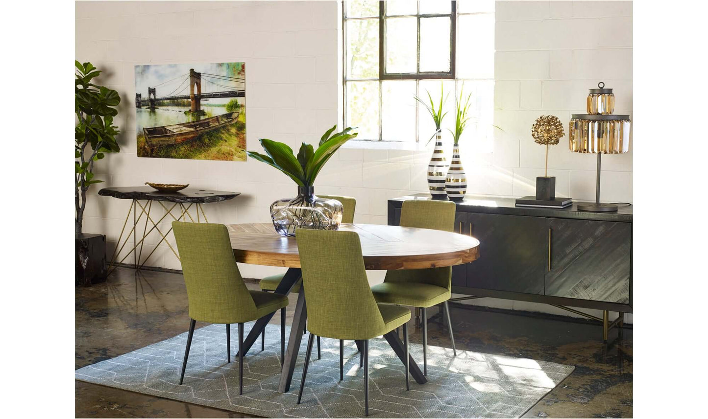 Parq Oval Rustic Dining Table set in a stylish dining room with green chairs