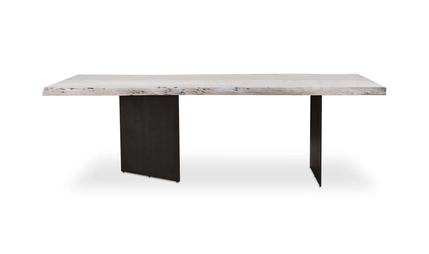 Straight-on view of the rectangular industrial dining table by Moe’s Home Collection, featuring a white-washed acacia wood top and iron legs.