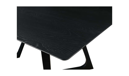 Close-up of the black wooden tabletop of the Godenza Black Rectangular Dining Table, showing the detailed wood grain.