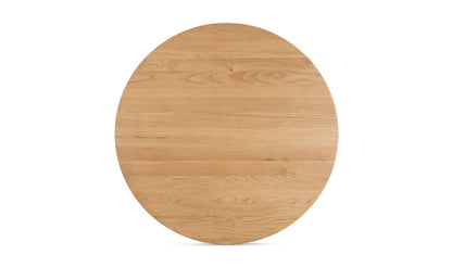 Top view of the Godenza Round Oak Dining Table, emphasizing its round shape and natural wood grains.