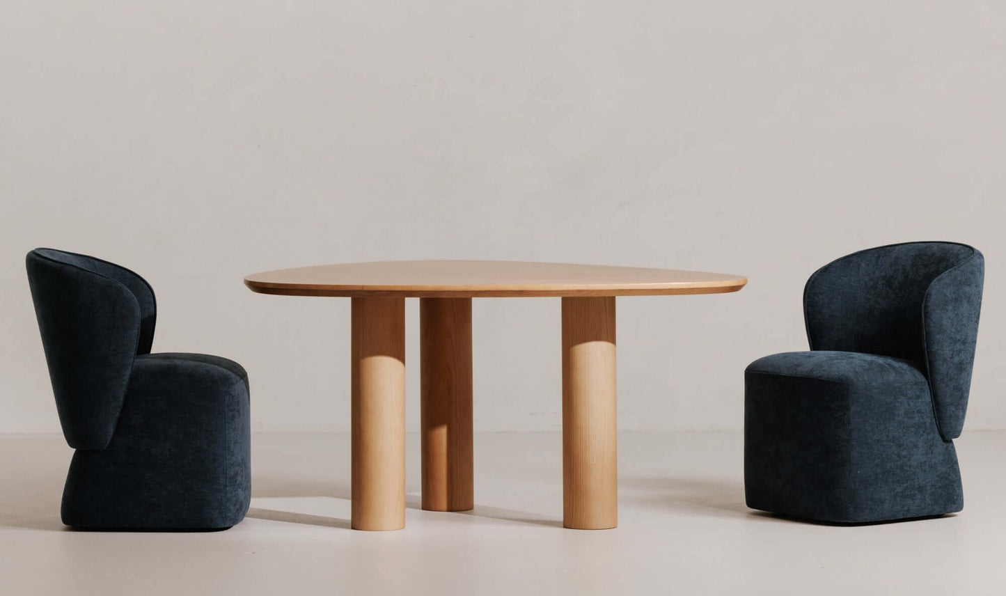 Larson Navy Blue Dining Chair paired with the Finley Dining Table in a modern setting.