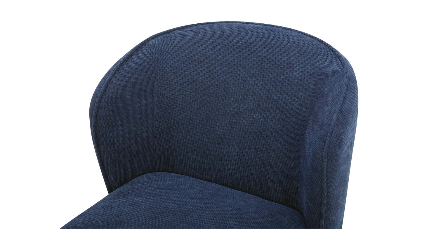 Close-up of the curved backrest of the Larson Navy Blue Dining Chair.