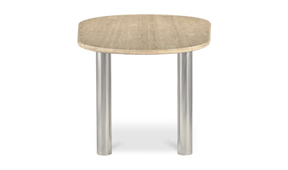 End view of the Fia Dining Table Travertine showcasing its solid Italian travertine surface.