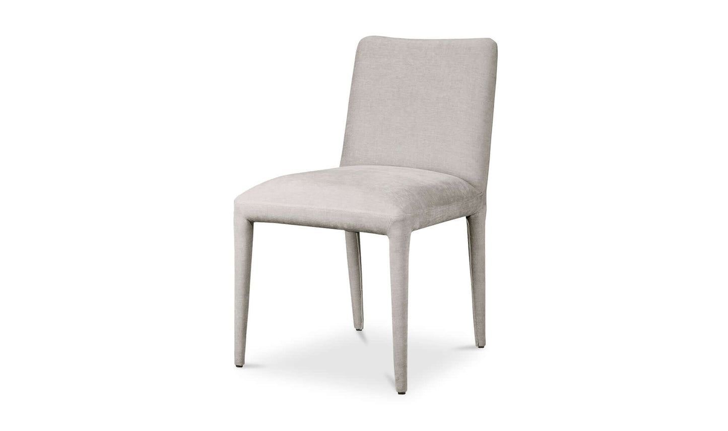 Side angle of Calla Light Grey Dining Chair, displaying the upholstered design and contemporary style.