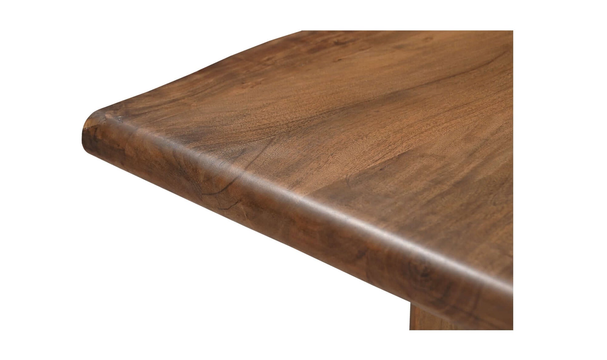 Detailed shot of the acacia wood grain and live edge on the Lila Small Dining Table Brown.