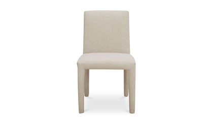 Full frontal view of the Monte Dining Chair in beige, emphasizing the smooth, minimalist design and durable fabric.