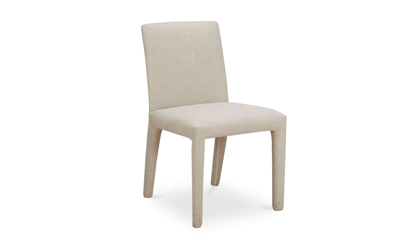 Angled view of the Monte Dining Chair Beige, highlighting the contemporary design and comfortable seat.