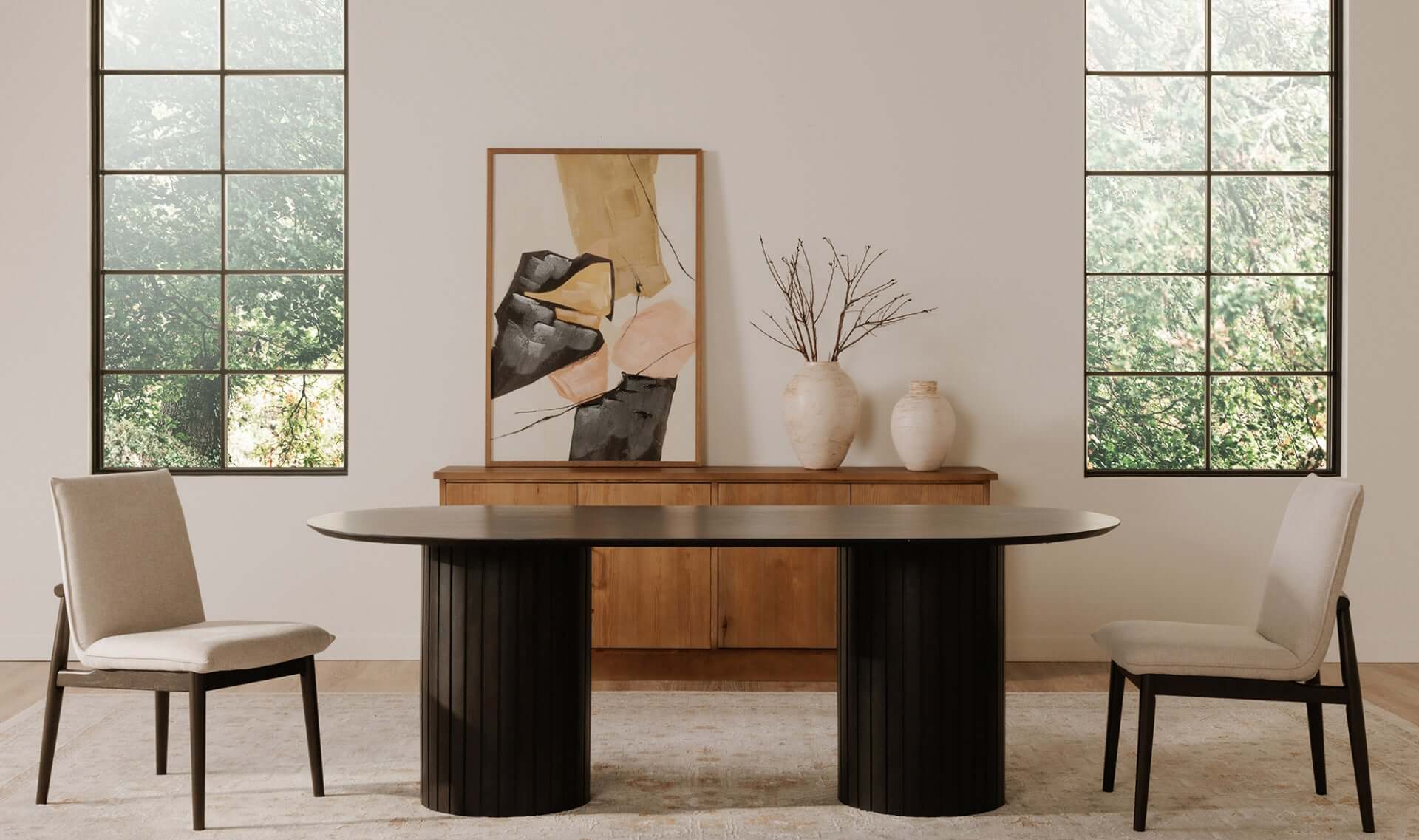 Pair of Charlie dining chairs positioned around a stylish dining table.