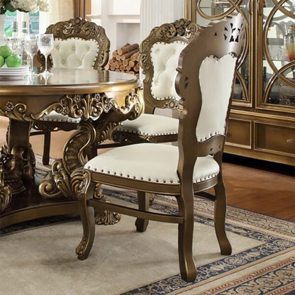 Detail view of the HOMEY DESIGN HD-8008 Dining Side Chair with antique gold finish and button tufted upholstery.