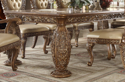 Detailed carved table base in metallic antique gold and perfect brown finish