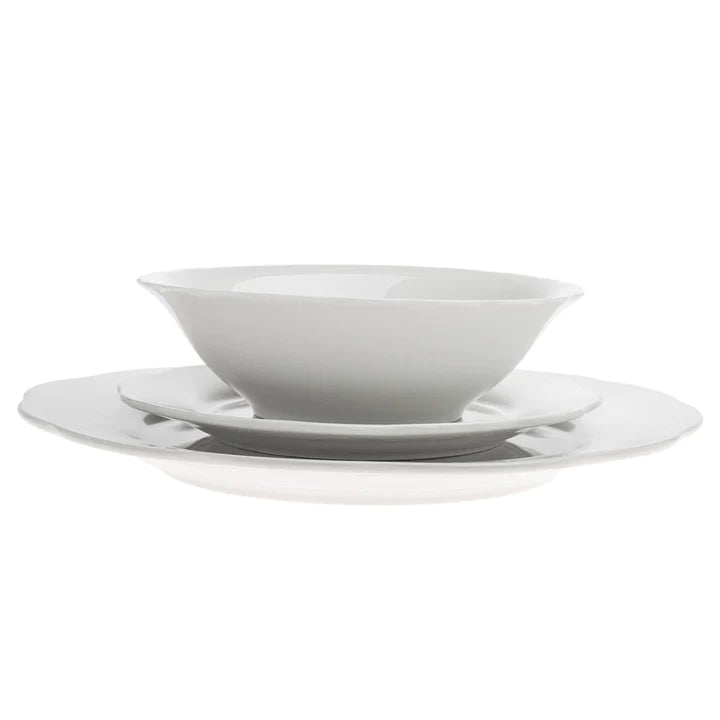 Front view of dinnerware set stacked with white backdrop