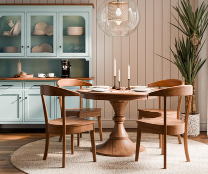 Dining room setup showcasing the Houston Hutch & Buffet with blue paint finish, paired with a wooden dining table and chairs, creating a cozy dining environment.