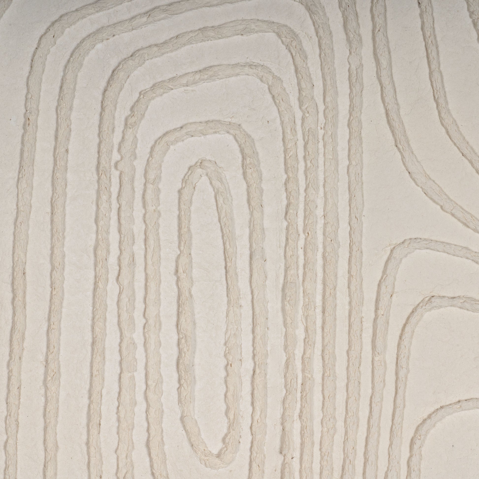 Detailed view of textured, topography-inspired patterns on the canvas.