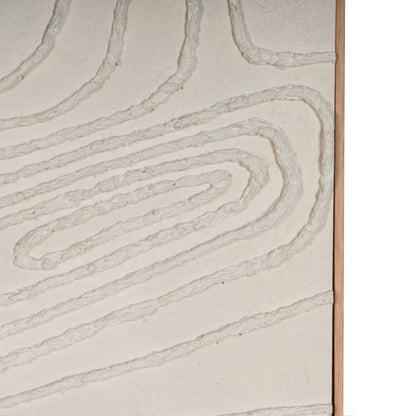 Close-up of abstract beige wall art showcasing textured, concentric patterns.