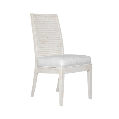 Stacked Bamboo Dining Chair in weathered white finish, front three-quarter view showcasing the chair's elegant design