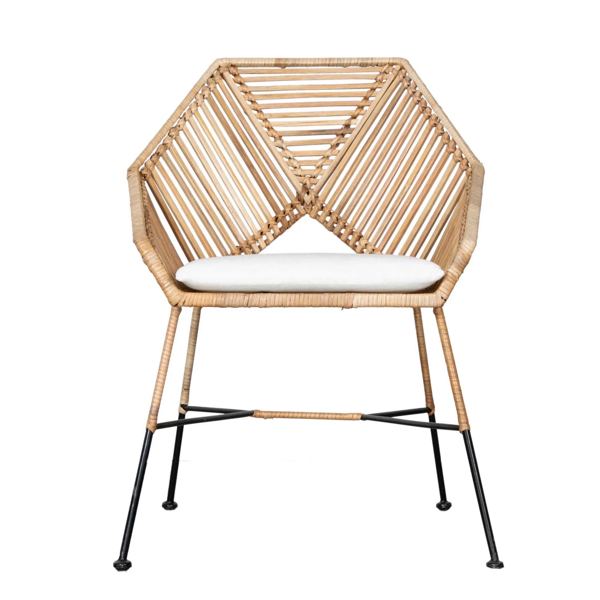 David Francis Baja Dining Chair with rattan dining room chair, featuring a unique hexagonal backrest and black metal legs.