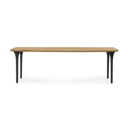 Full view of the Union Home Etro Dining Table, showcasing its length and seating capacity in a minimalist setting.