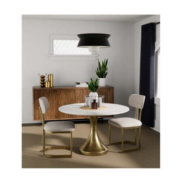 Stylish dining room setup featuring the Union Home Funnel Dining Table, with a white marble top and brass pedestal base.