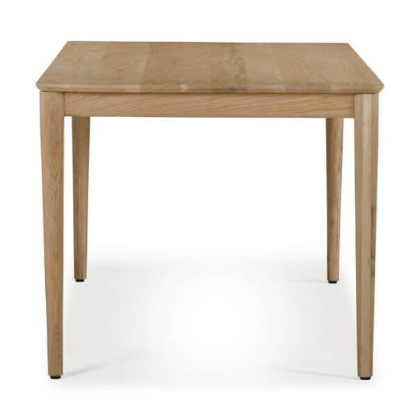 Front view of the Alden Dining Table Natural by Union Home, showing the table's length and clean lines.