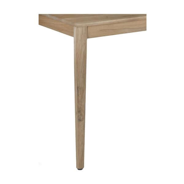 Leg detail of the Alden Dining Table Natural by Union Home, featuring a sleek natural finish.